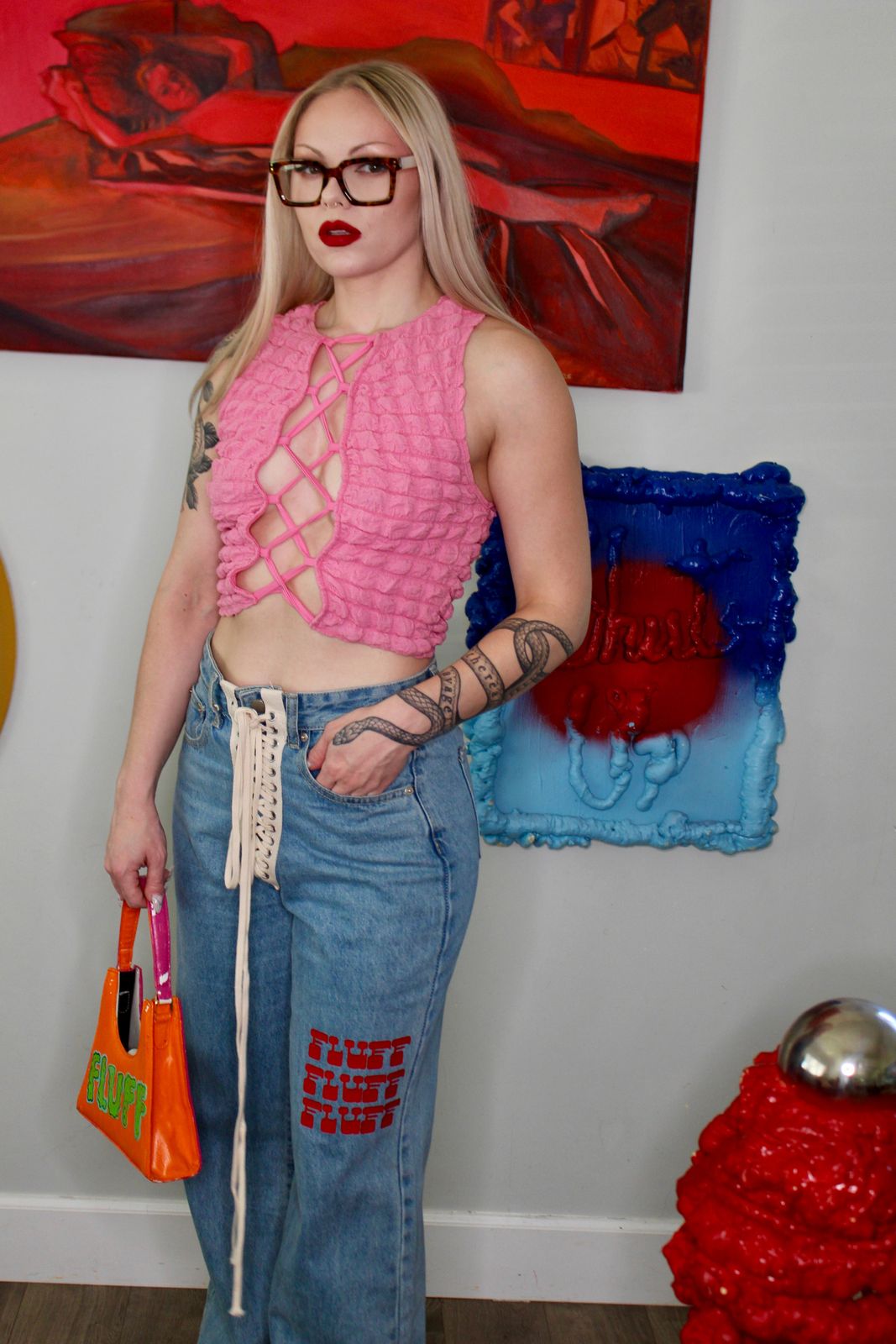 Bold Pink Tank Top with Blue Relaxed Bootcut Jeans and Orange Bag Bold Pink Tank Top with Blue Relaxed Bootcut Jeans and Orange Bag — Bootcut Jeans Outfits 2027 with Tank Top