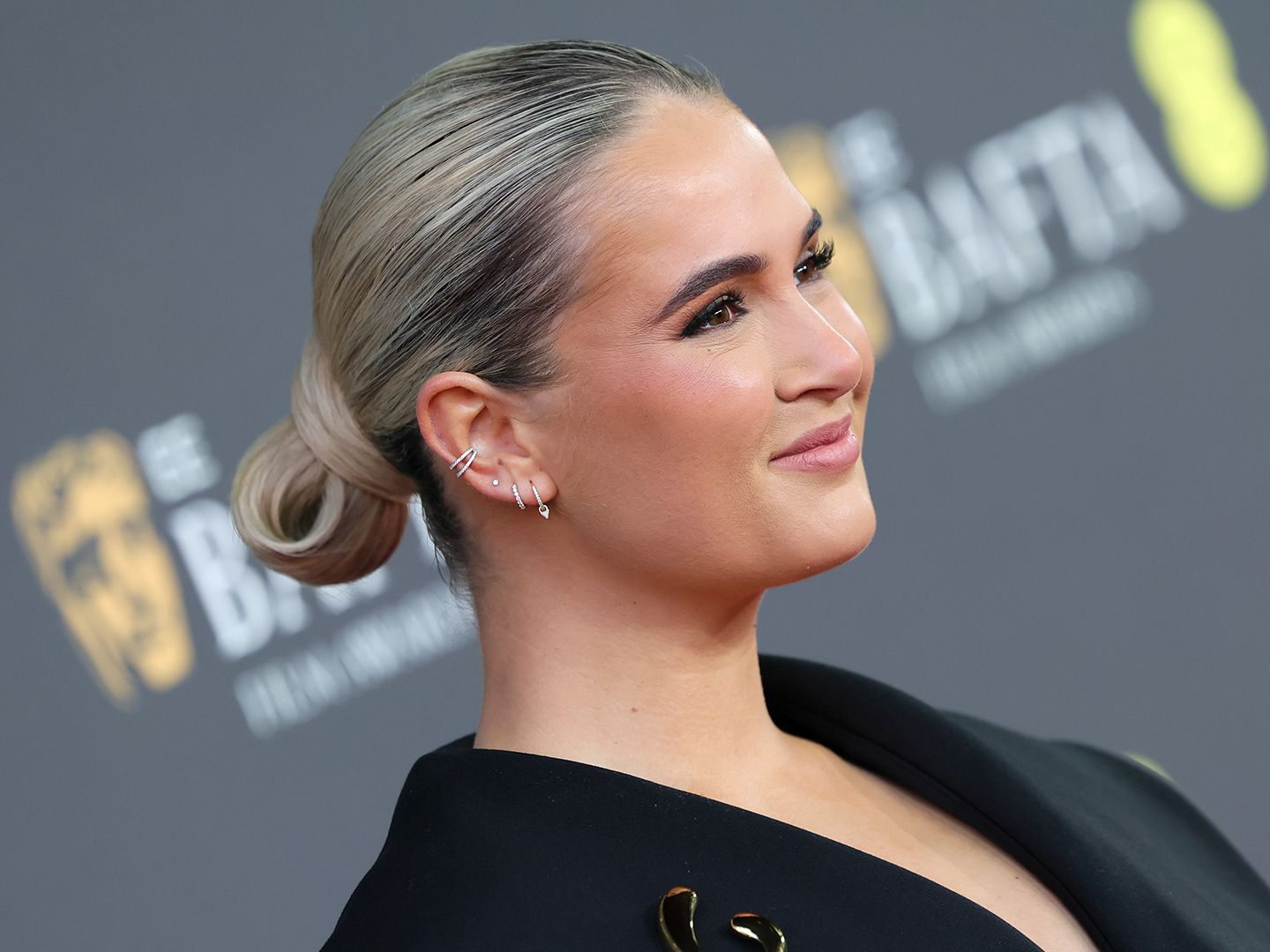 Sculpted Ash Blonde Low Bun Sculpted Ash Blonde Low Bun — Slicked Back Bun 2027
