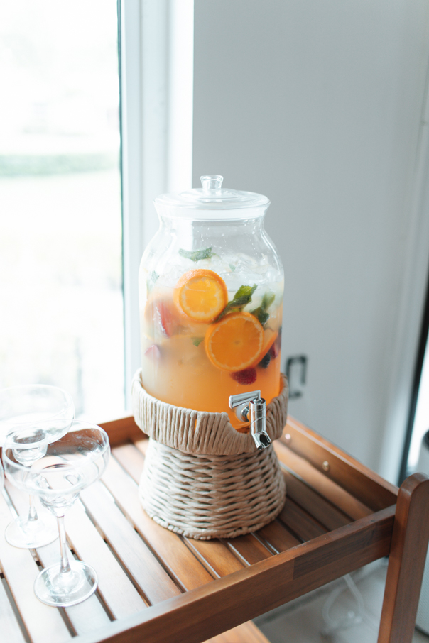 Artisanal Drink Dispenser with Fresh Fruit Garnish — Sip and See Outfits 2027