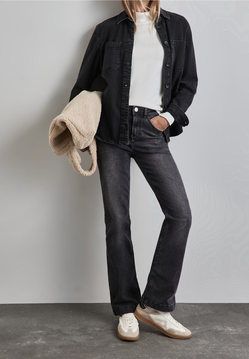 Black Bootcut Jeans with White Turtleneck and Denim Jacket — Black Bootcut Jeans Outfits 2027