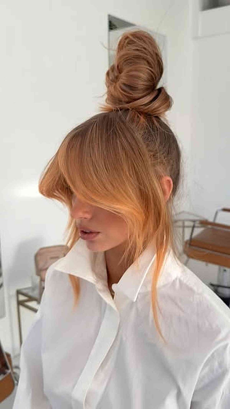 Honey Blonde Knotted Bun With Curtain Bangs — Knotted Bun Hairstyles 2027