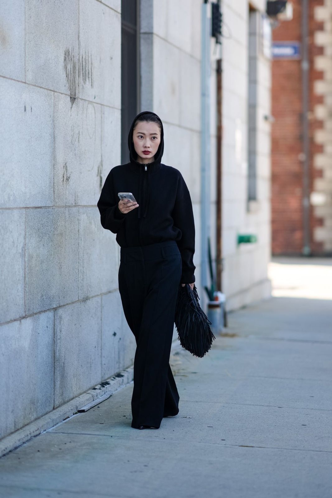 Monochromatic Black Hoodie and Wide-Leg Trousers — Winter Minimalist Outfits 2027
