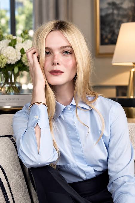Elle Fanning in powder-blue ensemble