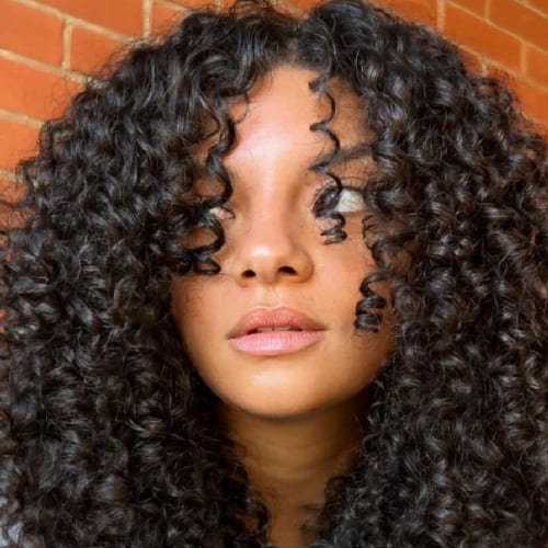 Layered Shag With Curtain Bangs Layered Shag With Curtain Bangs — Curly Haircuts 2027
