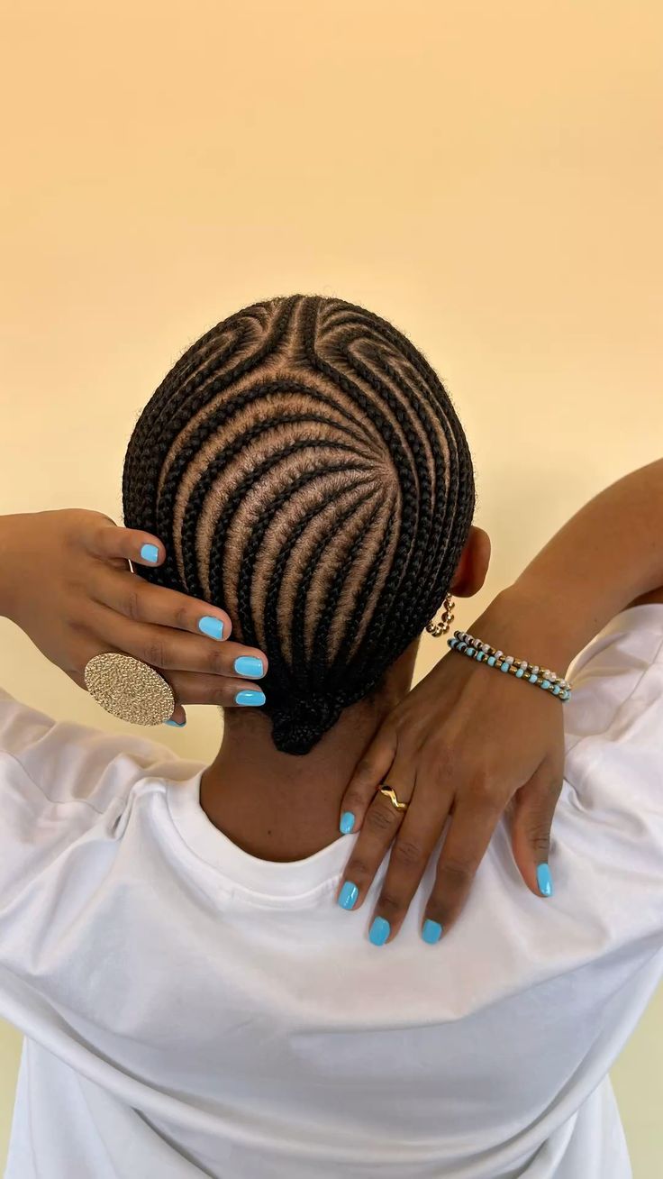 Swirling Scalp Cornrows Into A Low Bun Swirling Scalp Cornrows Into A Low Bun — 6 Cornrows 2027