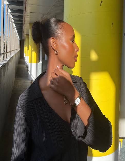 Sleek Black High Bun From Side Sleek Black High Bun From Side — Sleek Bun 2027
