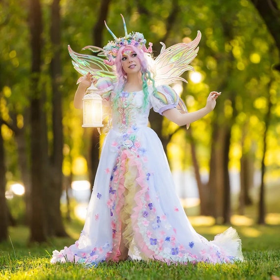 White Fairycore Gown with Pastel Rainbow Ruffles and Iridescent Wings — Fairycore Outfits 2027