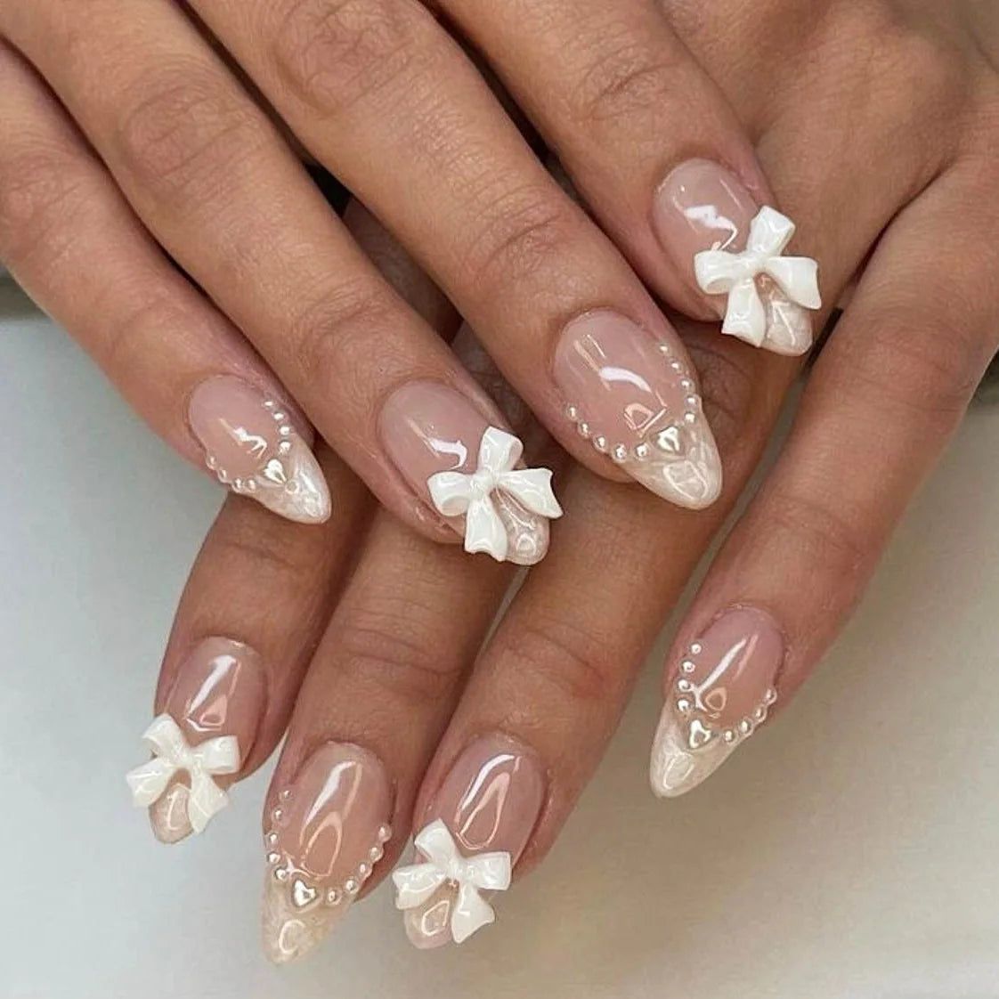 Medium Stiletto White 3D Bows And Pearls Medium Stiletto White 3D Bows And Pearls — Bow French Tip Nails 2027