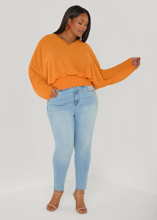 Vibrant Orange Dolman Top with Skinny Jeans — Curvy Outfits 2027