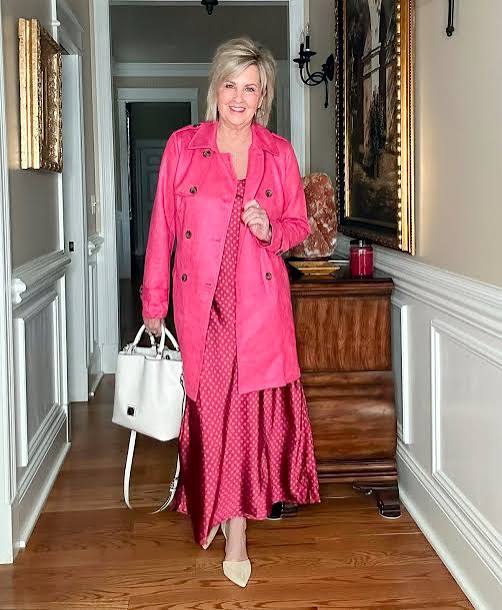 Bright Pink Trench Coat Over Pink Patterned Satin Dress Bright Pink Trench Coat Over Pink Patterned Satin Dress — Date Night Outfits 2027 for Women Over 50