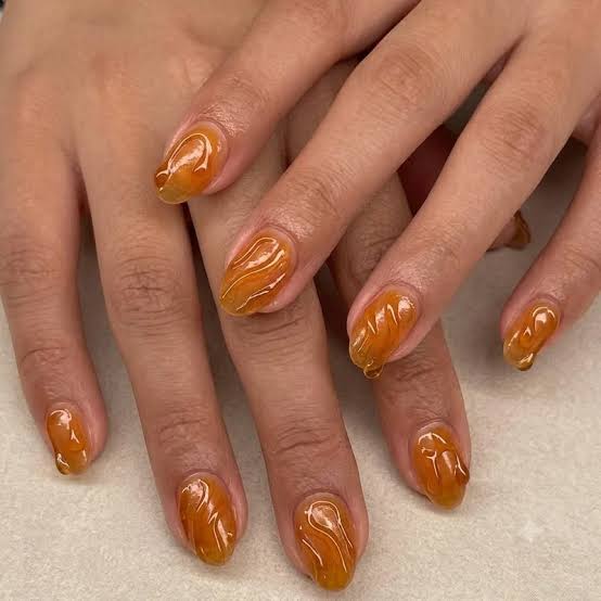 Jelly Amber Swirl Oval Nails Jelly Amber Swirl Oval Nails — Gel X Nails 2027