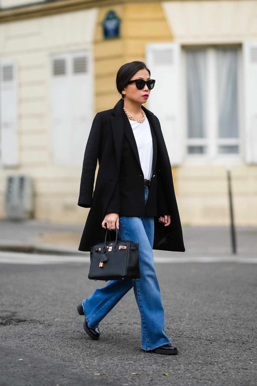 Blue Bootcut Jeans with a Black Coat and Loafers — Work Bootcut Jeans Outfits 2027