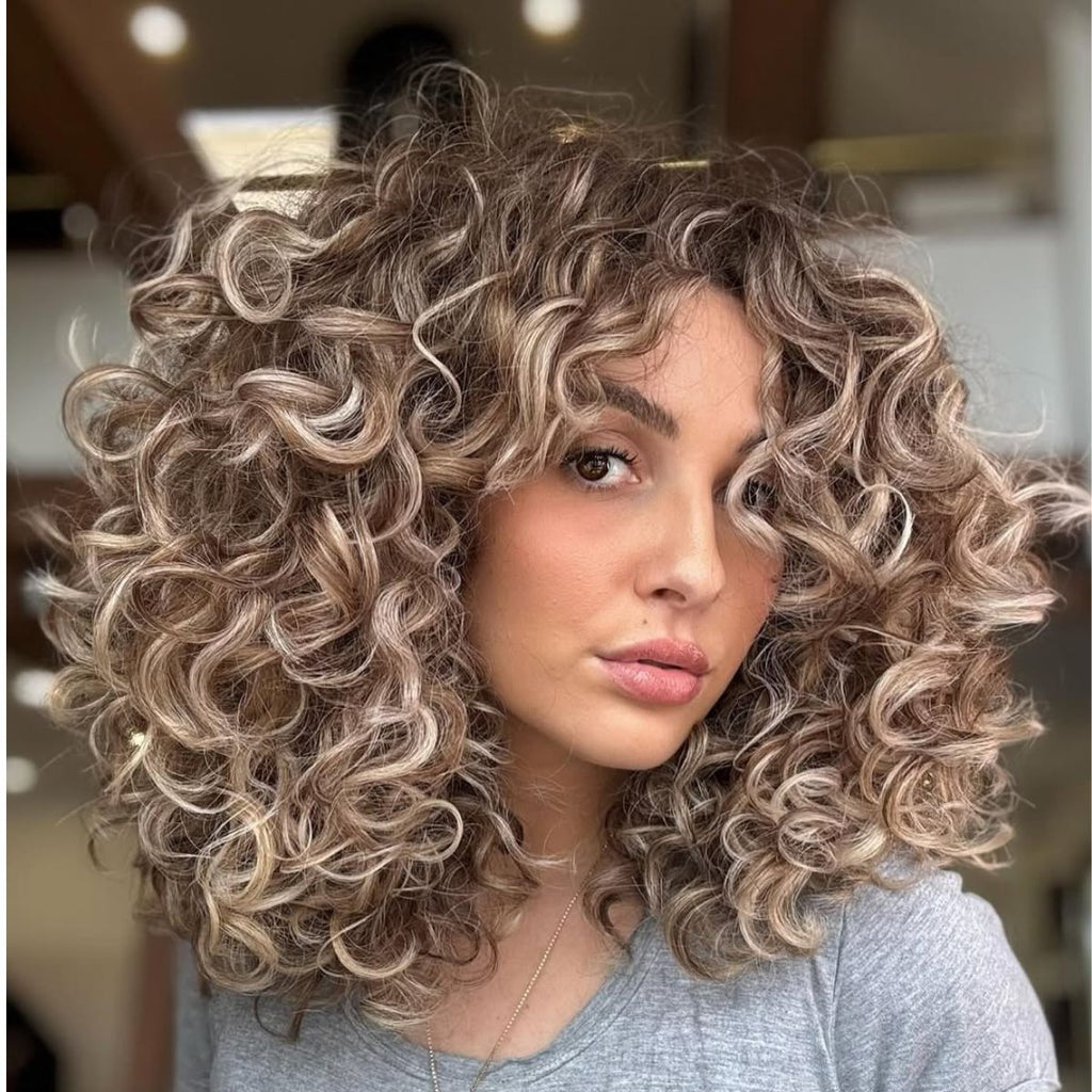 Blonde Curly Pixie With Short Bangs Blonde Curly Pixie With Short Bangs — Curly Haircuts 2027