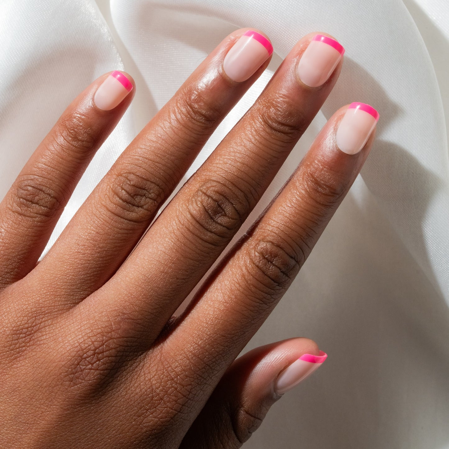 Glossy Milky Pink with Sharp Hot Pink Tips Glossy Milky Pink with Sharp Hot Pink Tips — Short Pink French Tip Nails 2027