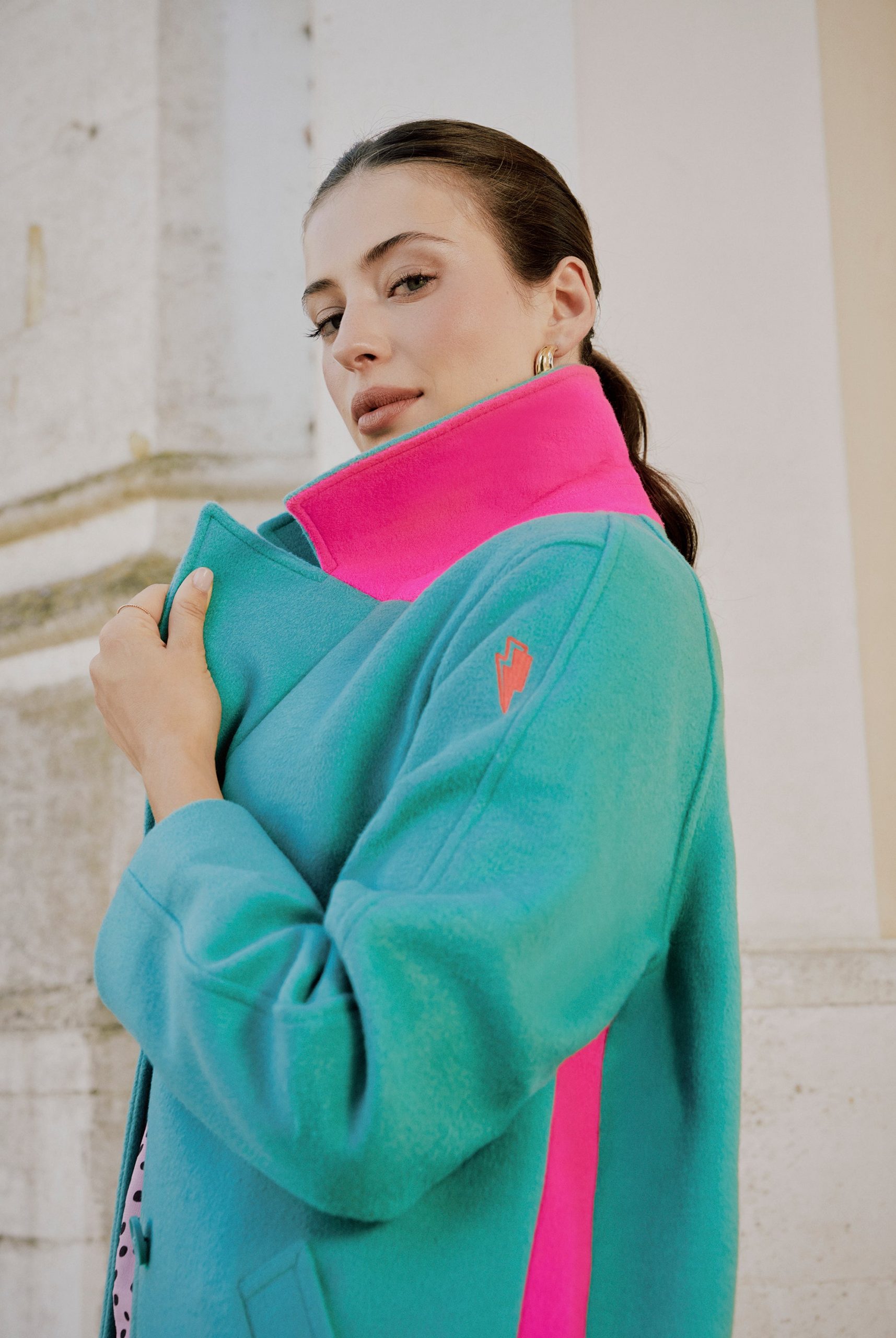 Bold Contrast: Teal Coat with Neon Pink Collar — Neon Outfits 2027