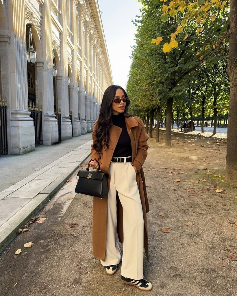 Long Brown Wool Coat Over Black Turtleneck with Cream Trousers Long Brown Wool Coat Over Black Turtleneck with Cream Trousers — Brown Coat Outfits 2027