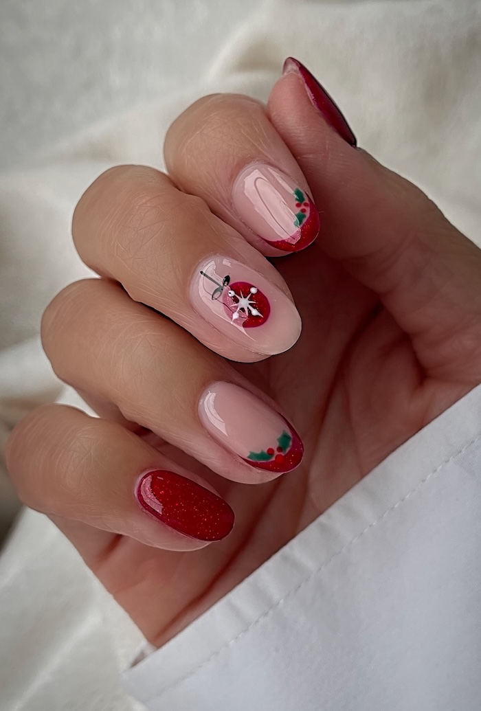 Sheer Nude French Tips with Holly Accent — Short Christmas Nails 2026
