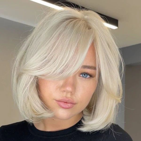 Chin Bob With Face-Framing Curtain Bangs Chin Bob With Face-Framing Curtain Bangs — Hairstyles 2027 for Square Faces