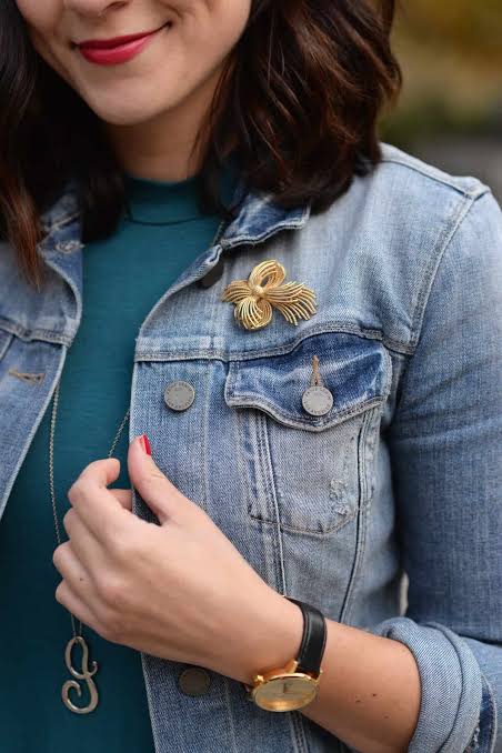 Denim Upgrade: Gold Bow Brooch on a Light Blue Denim Jacket Denim Upgrade: Gold Bow Brooch on a Light Blue Denim Jacket — Brooch Outfits 2027