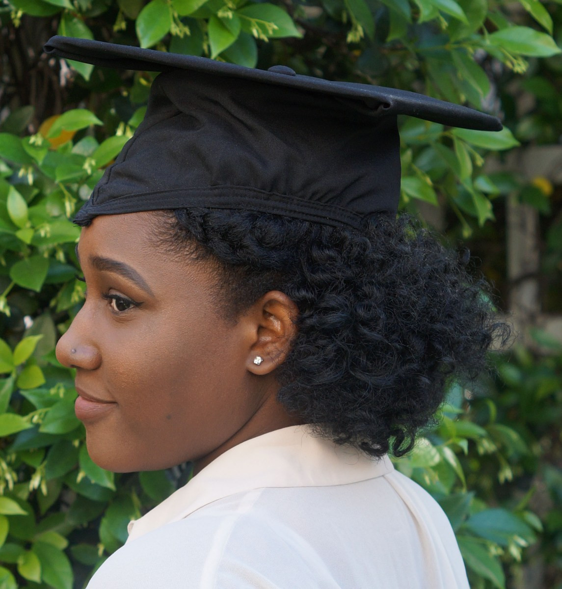 Black Curls Under Graduation Cap Black Curls Under Graduation Cap — Graduation Hairstyles Curls 2027