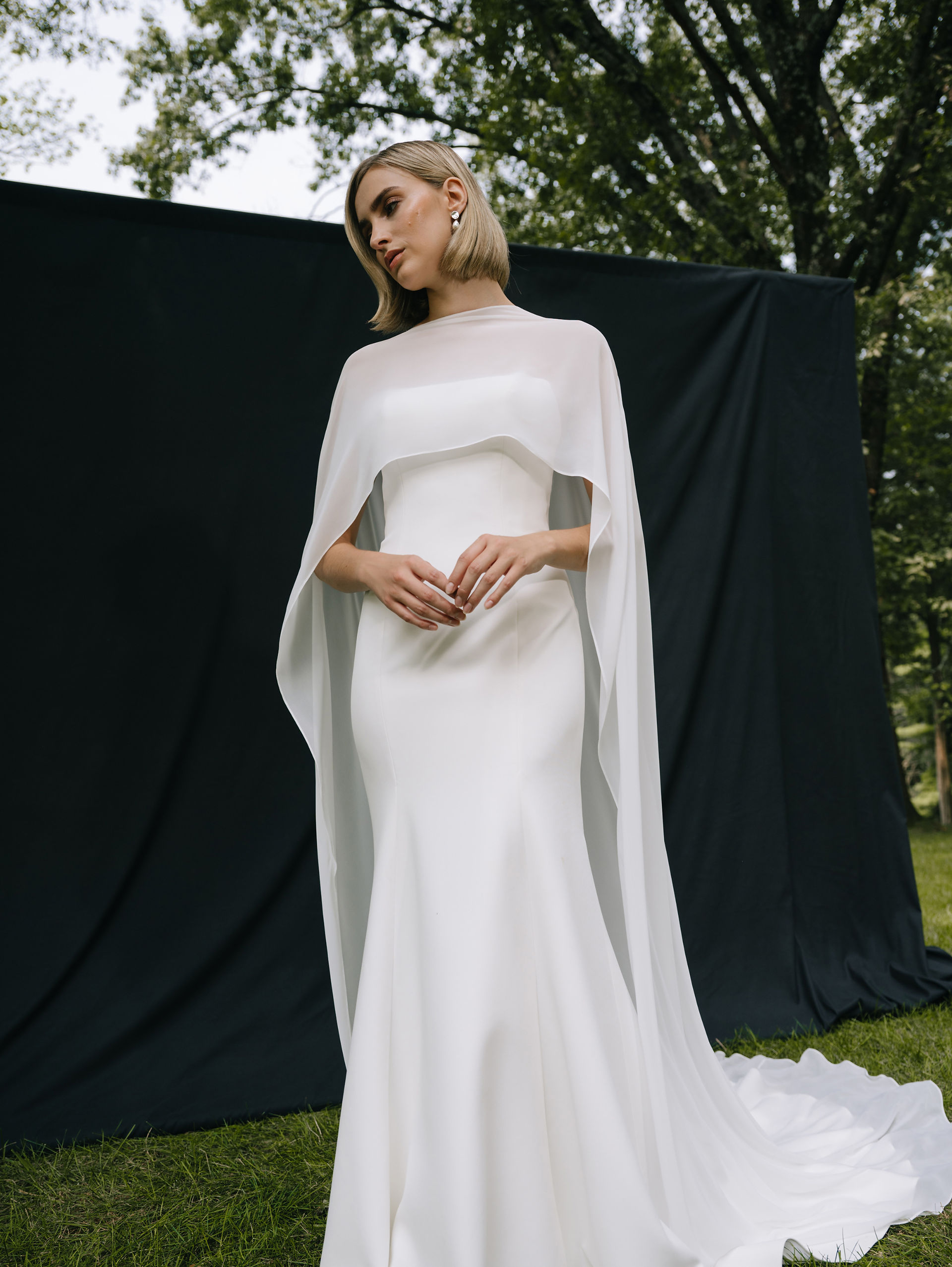 Ethereal Flow: Sheer Cape Overlay on a Trumpet Dress — Wedding Dress Trends 2027