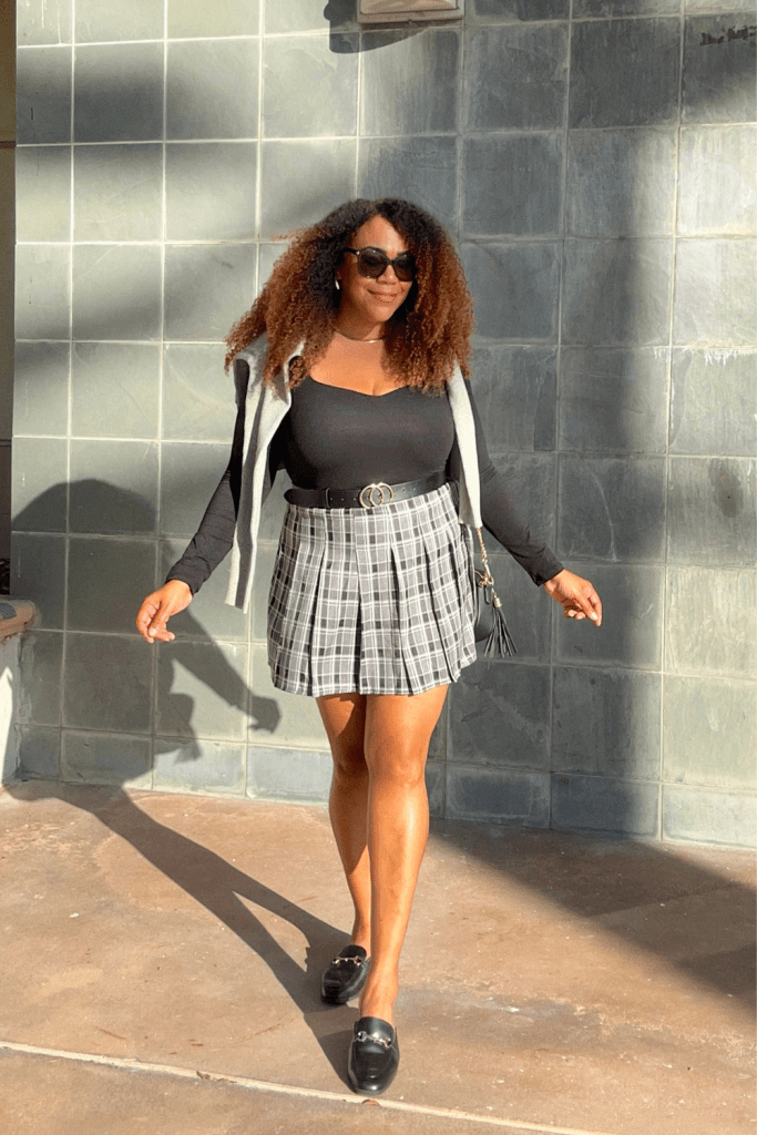 Grey Plaid Pleated Mini Skirt with Black Top and Cardigan — Pleated Skirt Outfits 2027