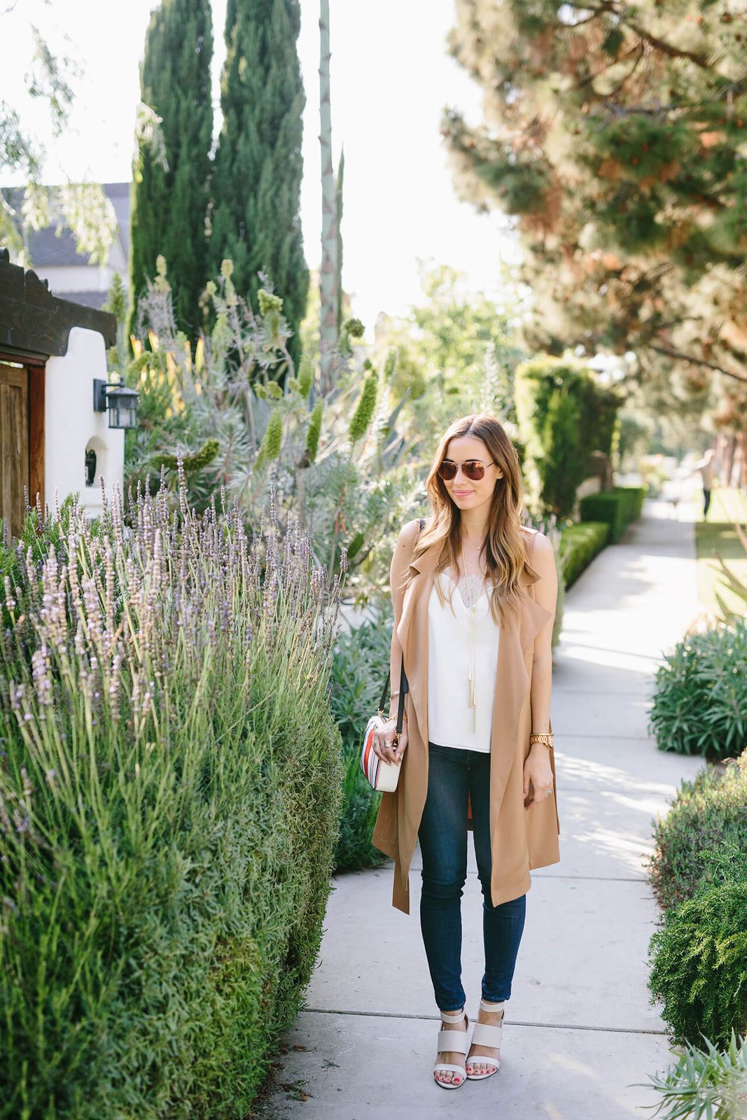 Tan Sleeveless Vest with Slim-Fit Jeans — Beige Spring Outfits 2027