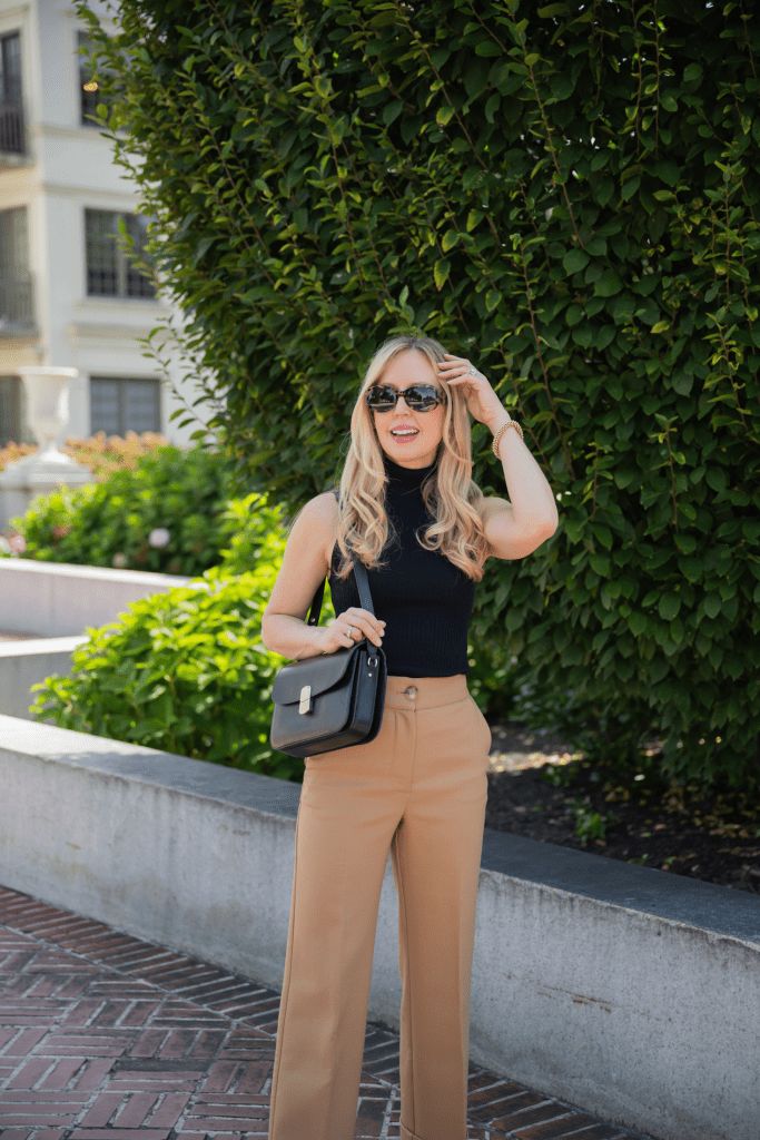 Black Sleeveless Turtleneck and Camel Trousers — Modern Heirloom Outfits 2027