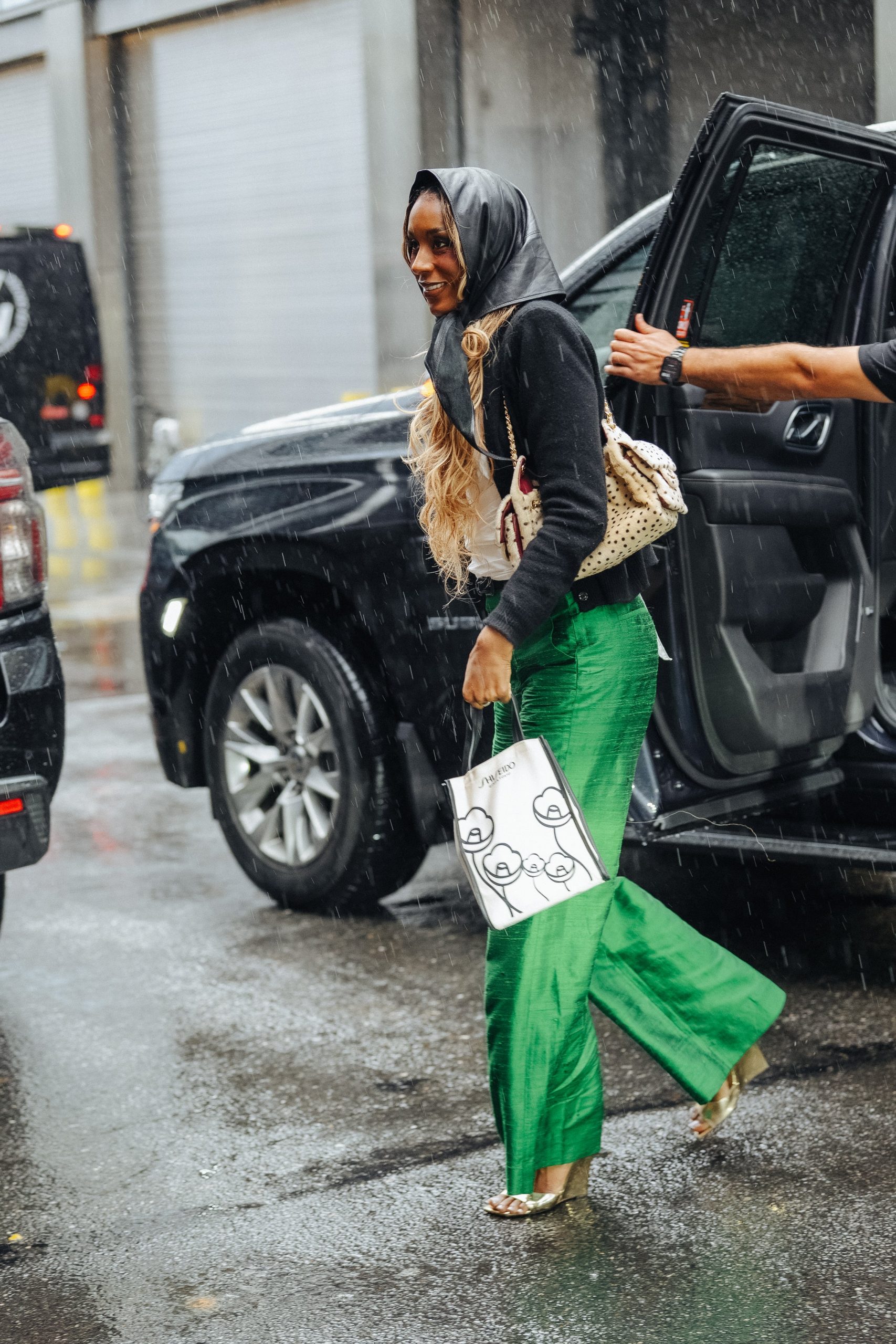 Vibrant Green Flared Trousers with Black Cardigan Vibrant Green Flared Trousers with Black Cardigan — Downtown Girl Outfits 2027