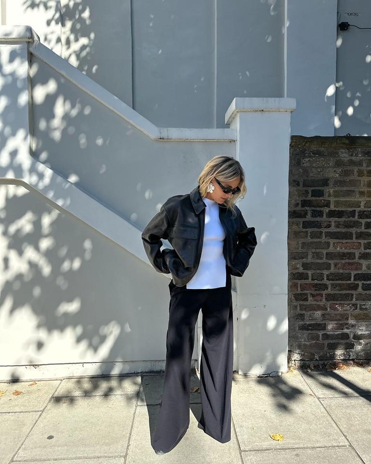 Faux Leather Jacket Over Tank and Wide-Leg Trousers for Edgy Brunch Faux Leather Jacket Over Tank and Wide-Leg Trousers for Edgy Brunch — Brunch Outfits 2027