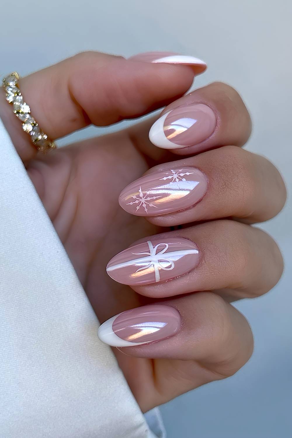 Pearlescent Nude French Snowflake Oval Nails — White Christmas Nails 2026
