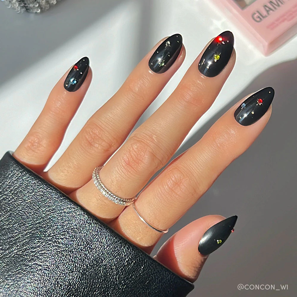 Glossy Black Scattered Gem Stiletto Nails Glossy Black Scattered Gem Stiletto Nails — Winter Black Nails 2027