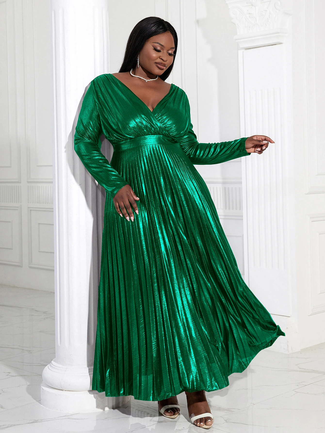Metallic Green Pleated Dress for a Festive Glow Metallic Green Pleated Dress for a Festive Glow — Christmas Party Outfits 2026