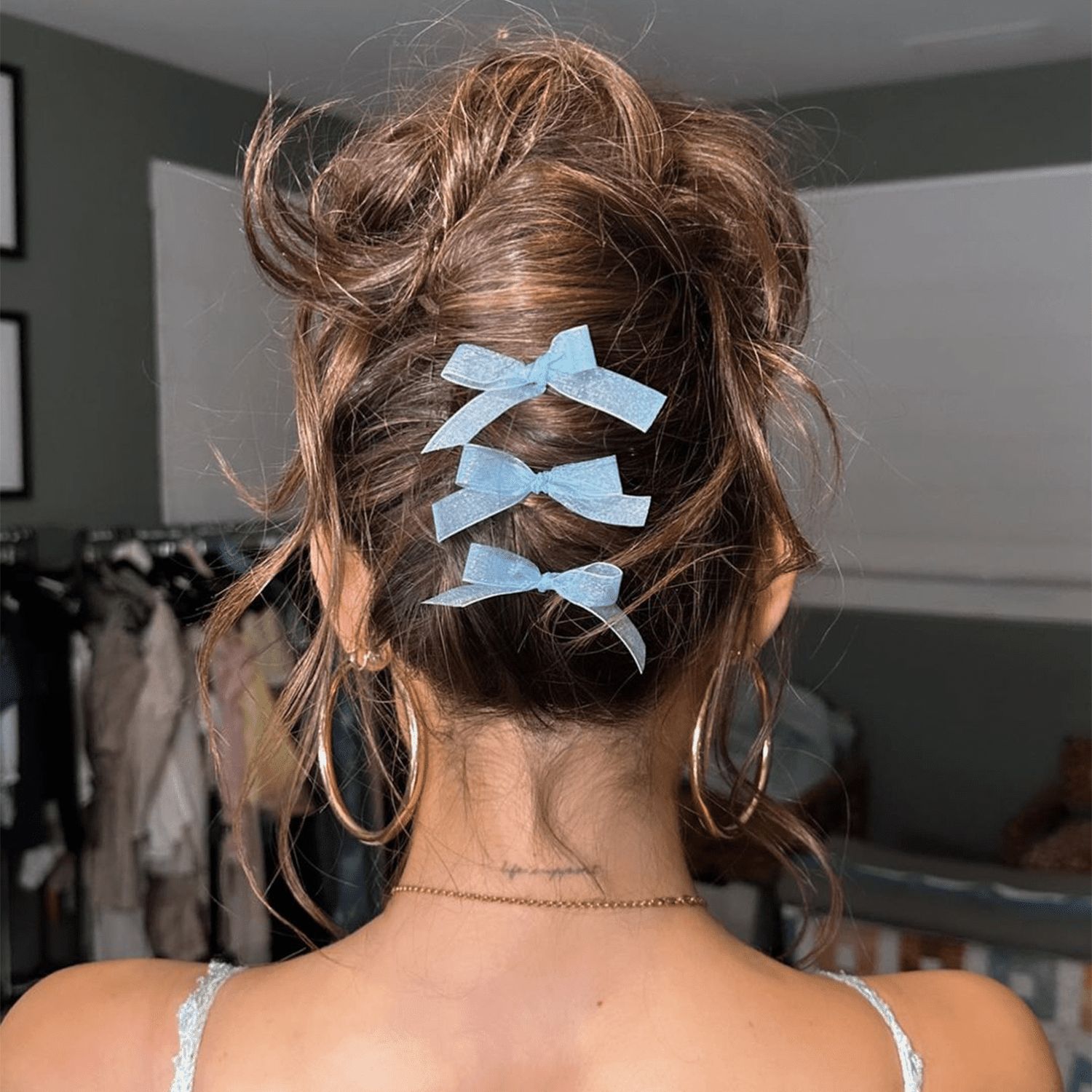 Messy Bun With Three Light Blue Bows Messy Bun With Three Light Blue Bows — Coquette Hairstyles 2027