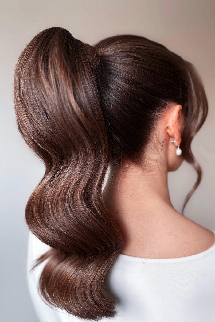 High Ponytail With Hollywood Waves High Ponytail With Hollywood Waves — Engagement Party Hairstyles 2027