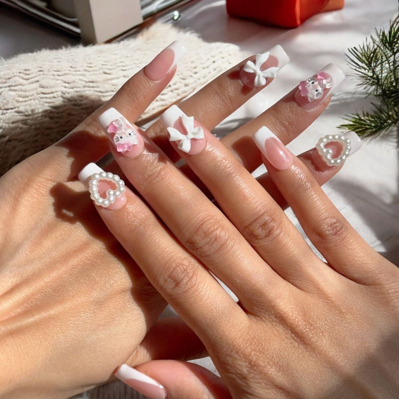 Feminine Playful Coffin French with 3D Hello Kitty Charms Feminine Playful Coffin French with 3D Hello Kitty Charms — French Hello Kitty Nails 2027