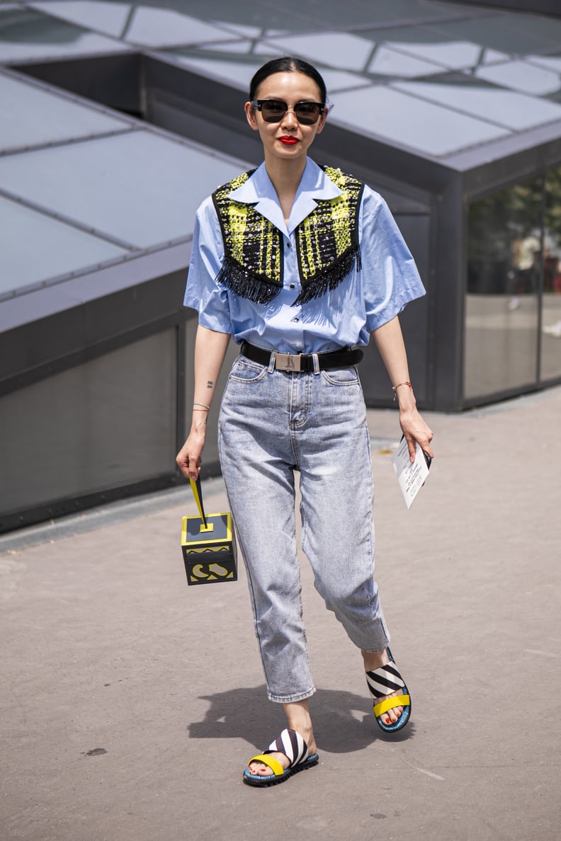 Playful Layers: Light Wash Jeans with Fringed Vest and Striped Sandals — Bootcut Jeans Outfits 2027 with Sandals