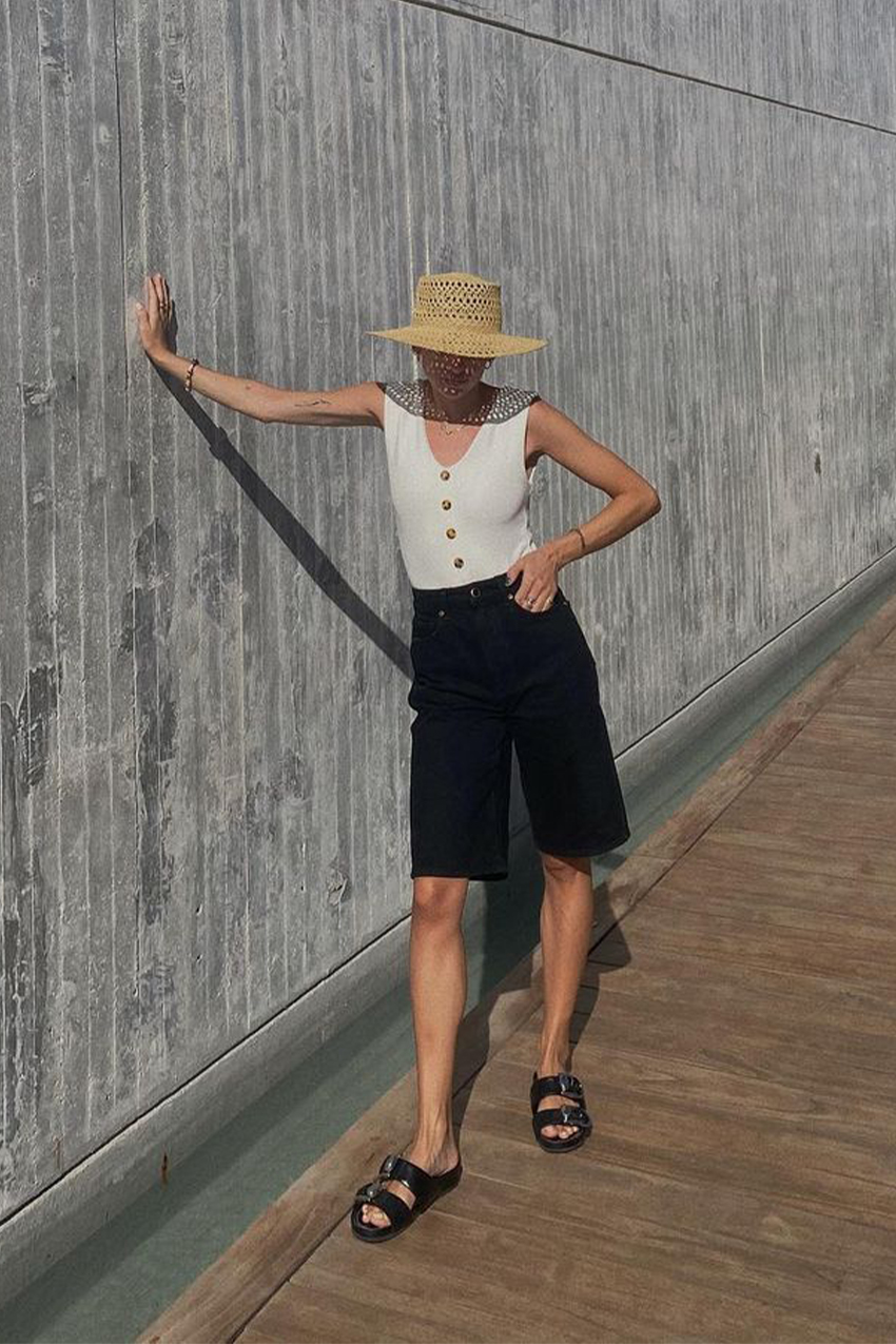 Relaxed White Top and Black Shorts for Daytime Resort — Cancun Outfits 2027
