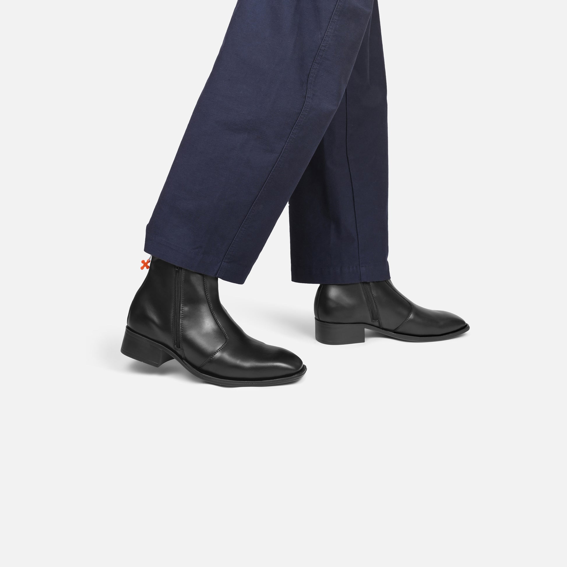 Subtle Orange Detail on Black Chelsea Boots with Navy Trousers Subtle Orange Detail on Black Chelsea Boots with Navy Trousers — Chelsea Boots Outfits 2027