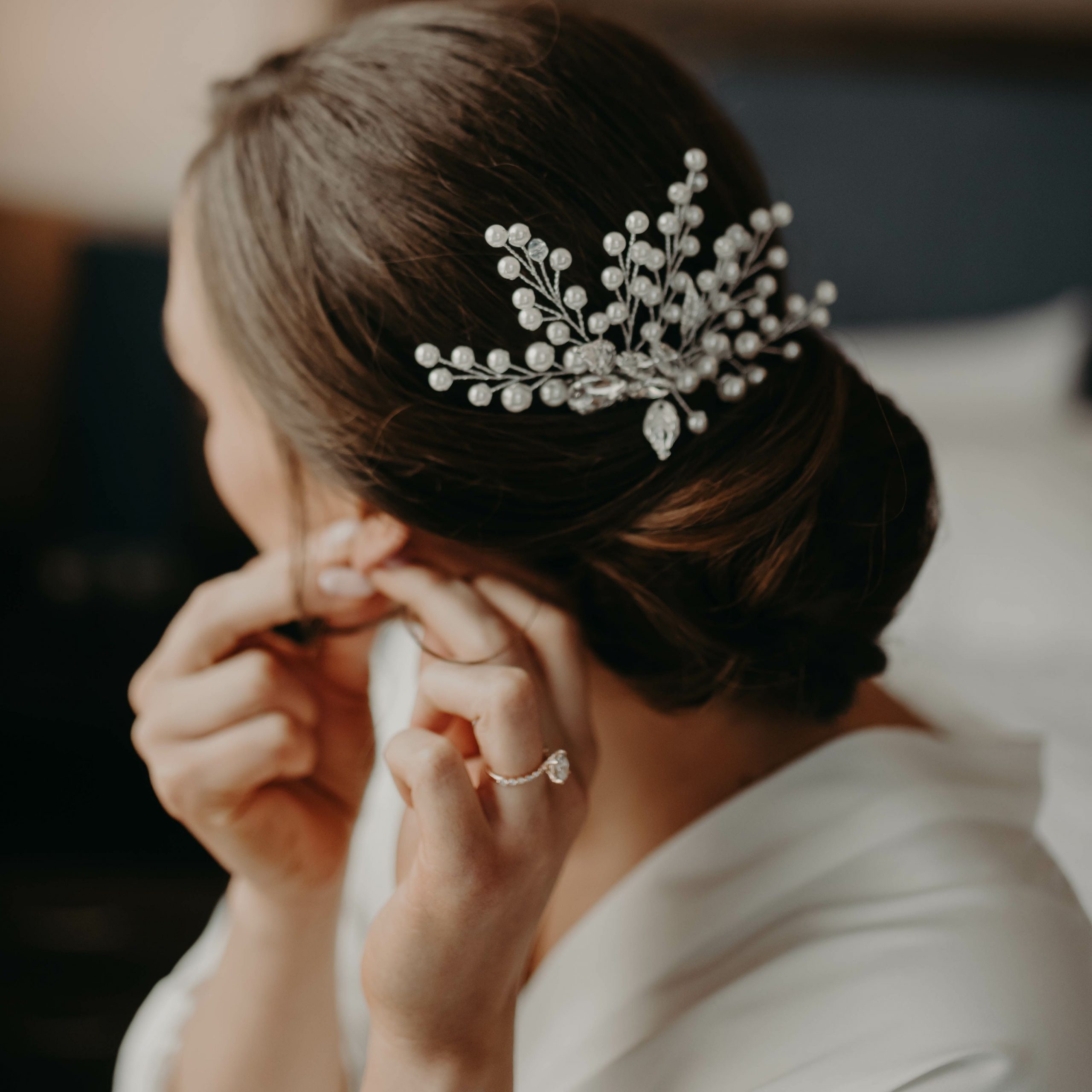Low Chignon With Jeweled Accessory — Wedding Updos 2027