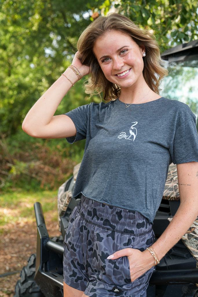 Graphic Edge: Camouflage Shorts with Cropped Tee Graphic Edge: Camouflage Shorts with Cropped Tee — Darty Outfits 2027