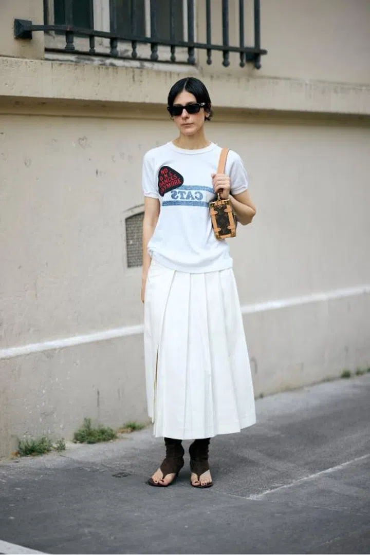 Crisp White Pleated Midi Skirt with Graphic T-Shirt and Gladiator Sandals — Pleated Skirt Outfits 2027