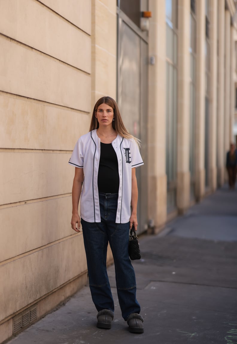 Layered Baseball Jersey Over T-Shirt with Wide-Leg Jeans Layered Baseball Jersey Over T-Shirt with Wide-Leg Jeans — Softball Outfits for Women 2027