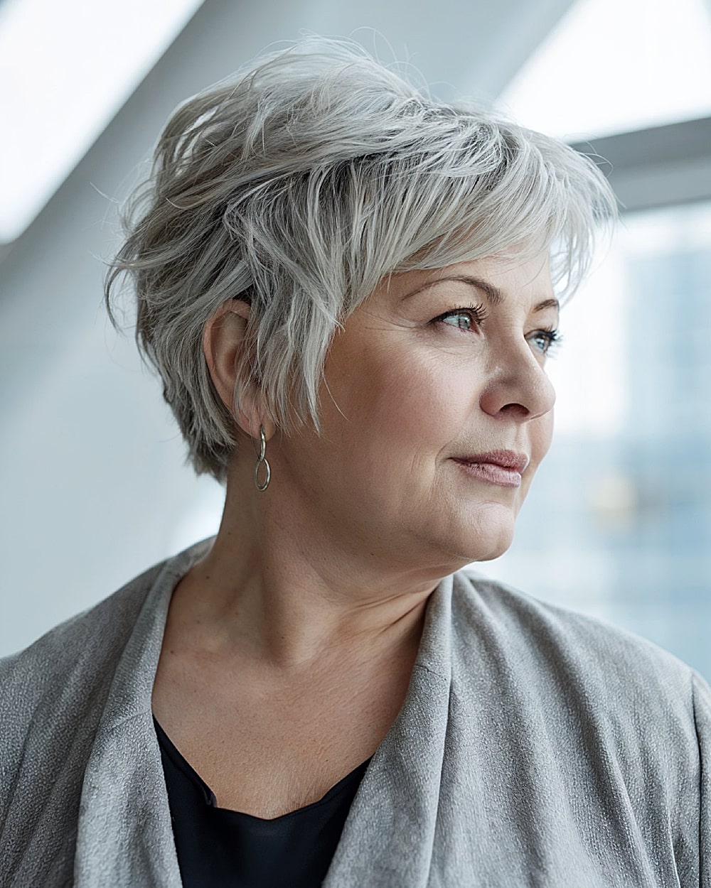 Voluminous Layered Pixie In Silver Grey Voluminous Layered Pixie In Silver Grey — Haircuts 2027 for Women Over 50