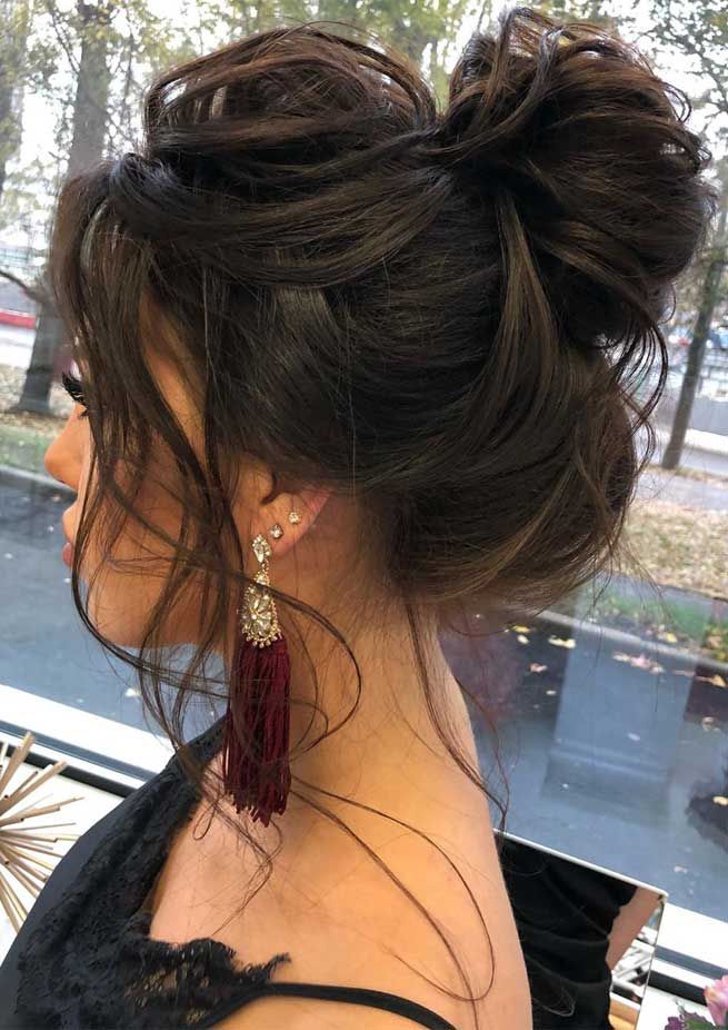 Voluminous High Messy Bun With Loose Strands — Party Hairstyles 2027