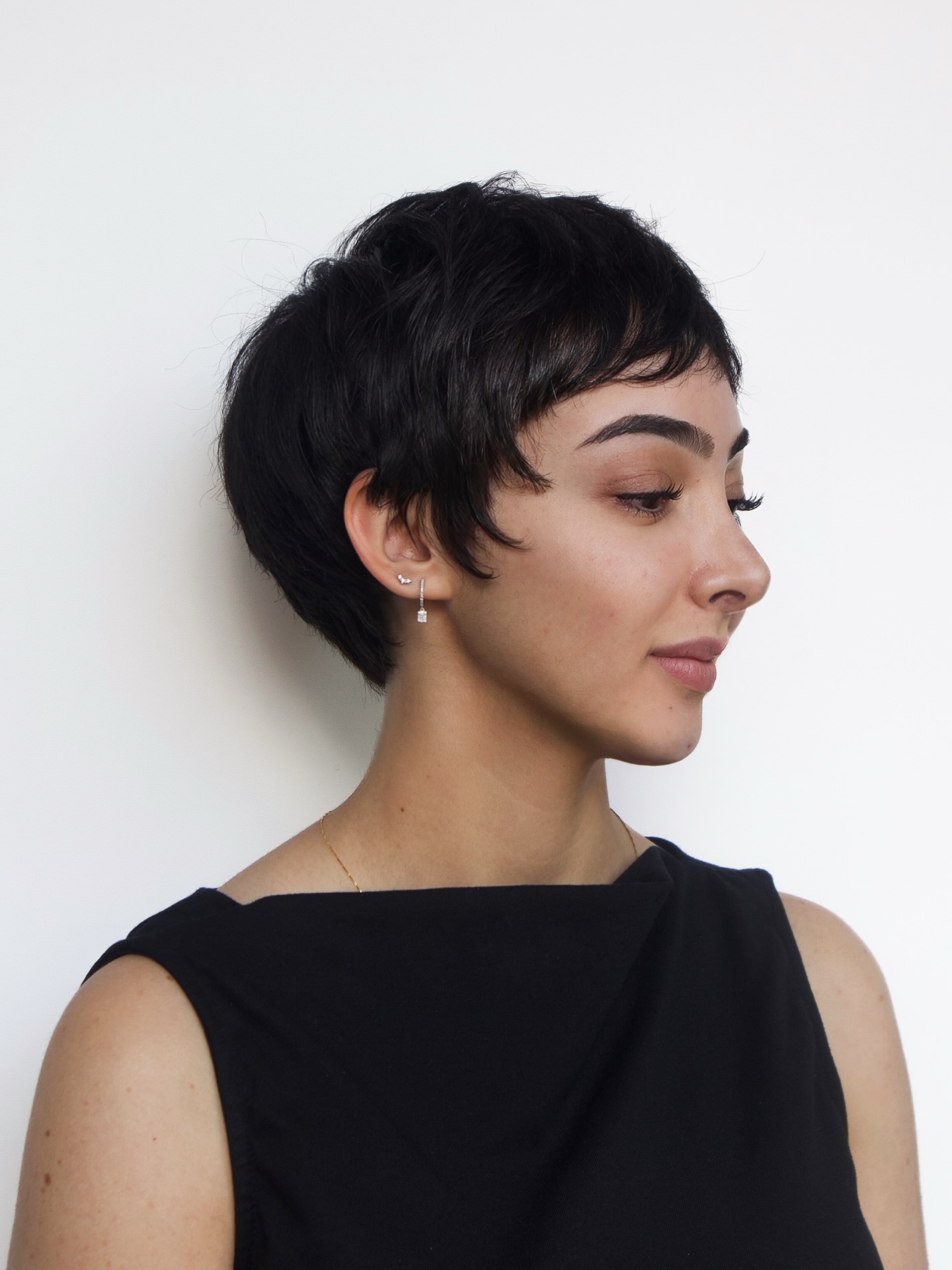 Ear Length Textured Dark Brown Pixie With Wispy Bangs Ear Length Textured Dark Brown Pixie With Wispy Bangs — Dark Brown Hair 2027