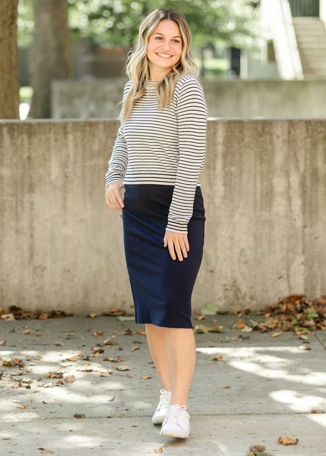 Pencil Midi Skirt with Striped Top and White Sneakers Pencil Midi Skirt with Striped Top and White Sneakers — Navy Blue Midi Skirt Outfits 2027