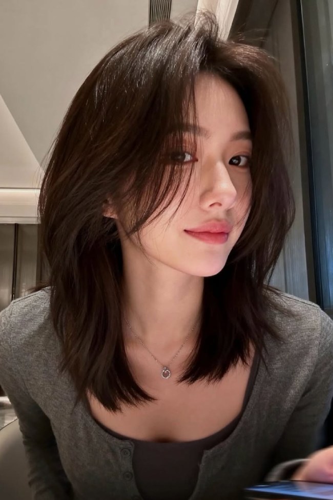Dark Brown Bob with Face-Framing Layers Dark Brown Bob with Face-Framing Layers — Hairstyles 2027 for Medium Hair