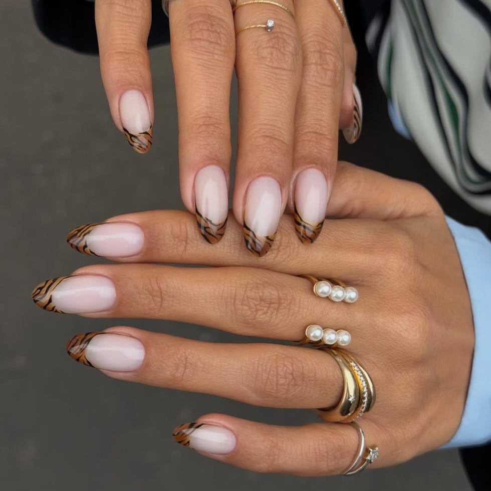 Tiger Print French Nude Oval Tiger Print French Nude Oval — Fall French Tip Nails 2026