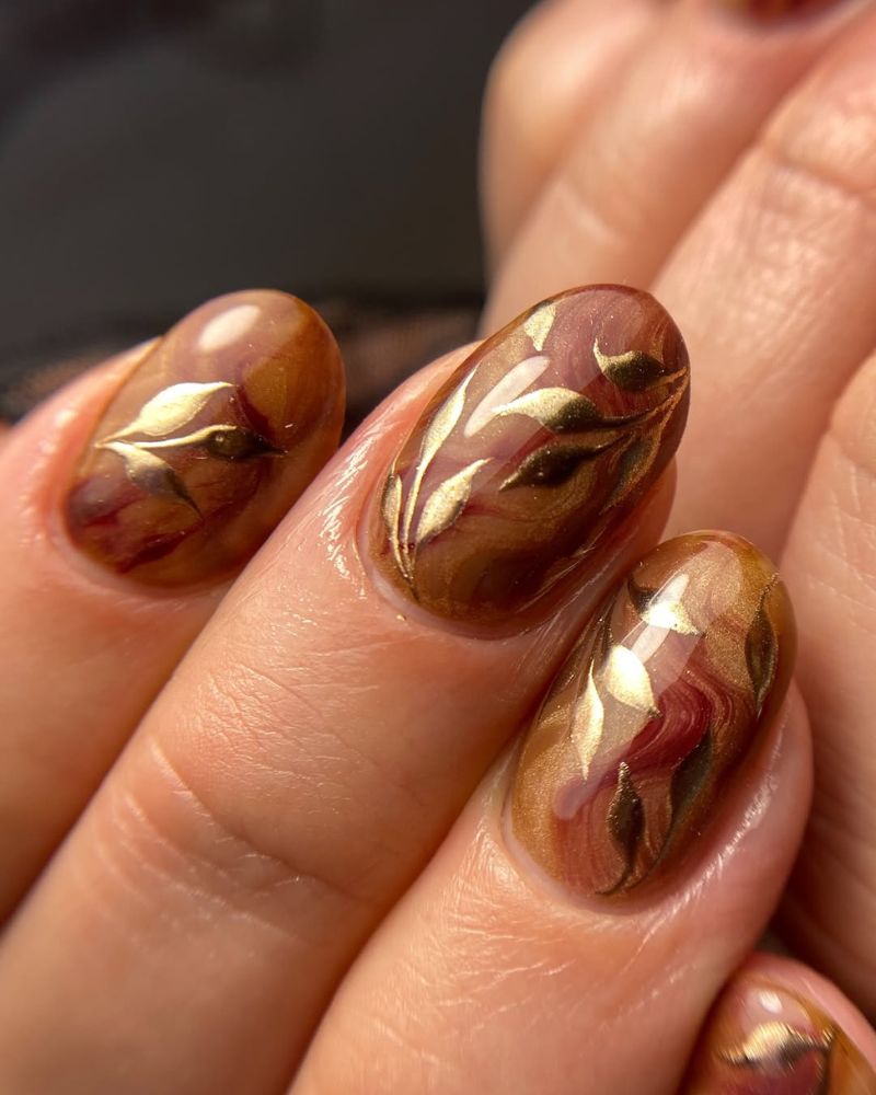 Artistic Matte Nude with Red-Brown Leaves — Simple Thanksgiving Nails 2026